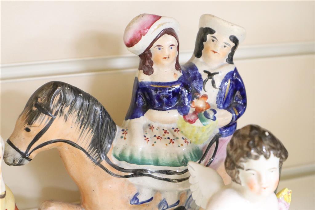 A group of Staffordshire figures and animals